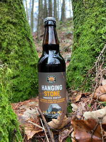 Our latest seasonal beer pictured in the woods beneath Hanging stone which it gets its name from . An iconic gritstone hanging over the village a 15 minute walk up from the brewery
